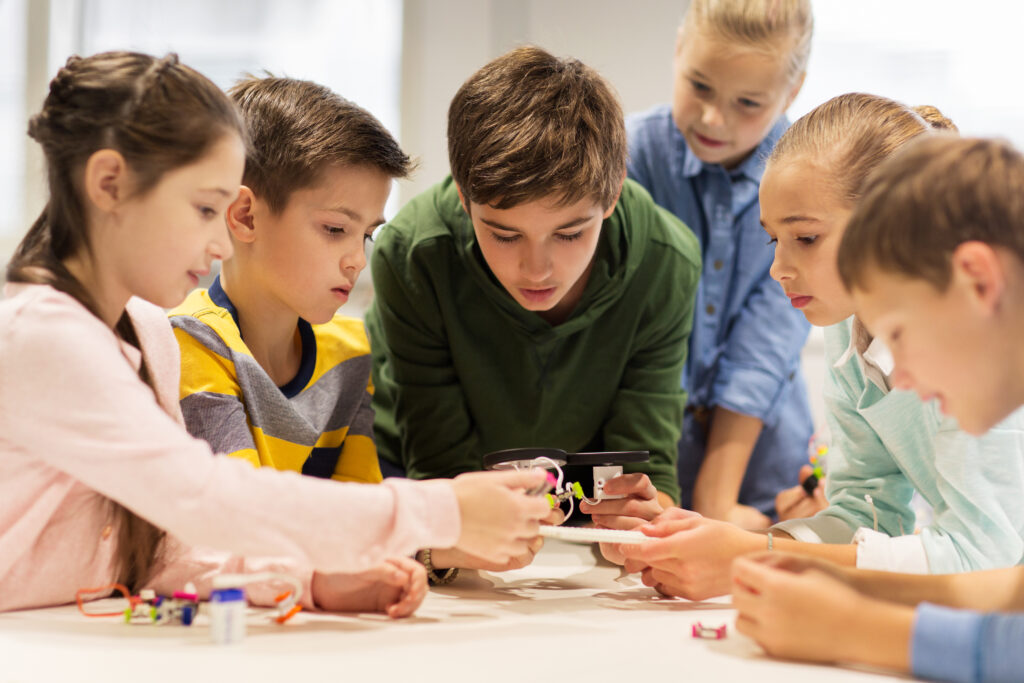 happy children building robots at robotics school 2022 12 16 09 40 25 utc