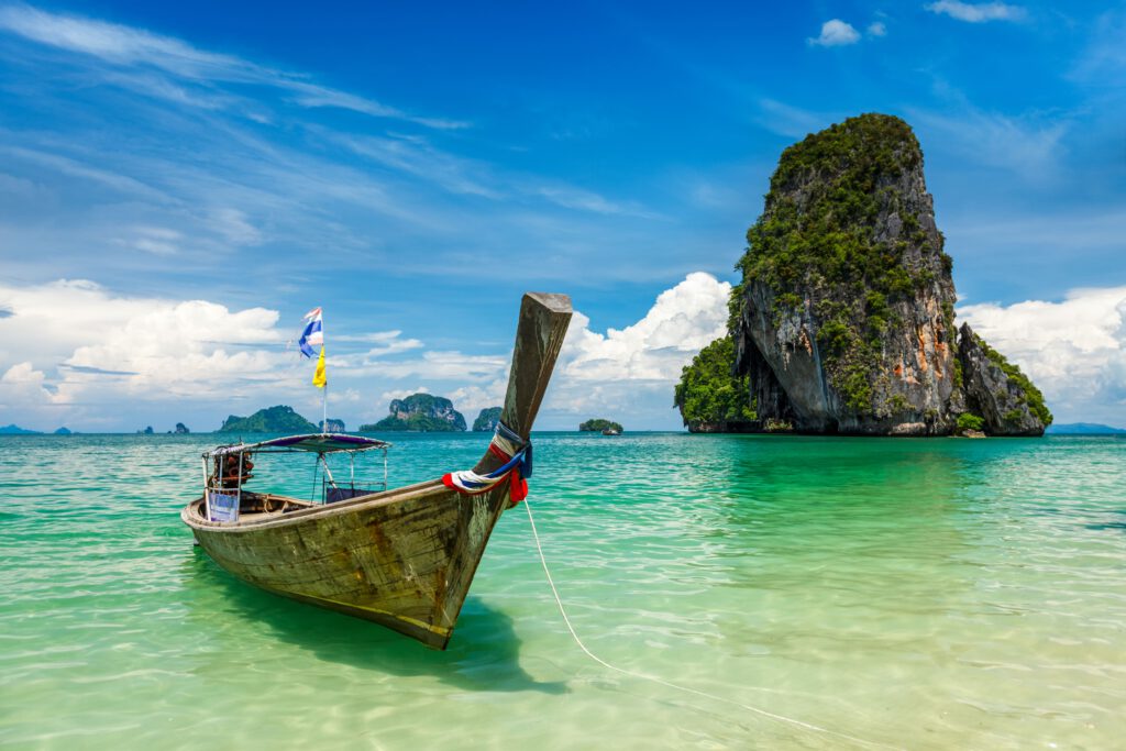 long tail boat on beach thailand 2023 12 15 19 01 13 utc
